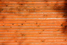 Wooden Wall From Red And Orange Natural Hardwood