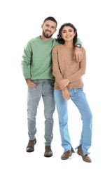 Sticker - Happy young couple in warm sweaters on white background