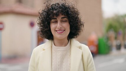 Sticker - Young woman smiling confident standing at street