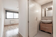 © Toyakisfoto.photos - Empty bedroom with large window and en suite bathroom with parquet floors