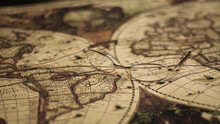 Close Up Of An Old Vintage Map With Magnifying Lens