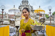 © Ferlin - Balinese girl worshipping at a temple
