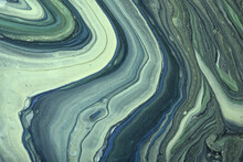 Abstract Fluid Art Background Green And Blue Colors. Liquid Marble. Acrylic Painting With Olive Gradient.