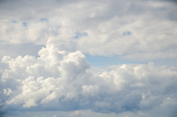 Wall Mural - Cloudscape background sky with gray cumulus clouds