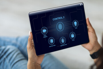 Poster - Cropped of woman using smart house application on digital pad