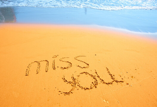 Miss you handwritten in sand for natural, symbol