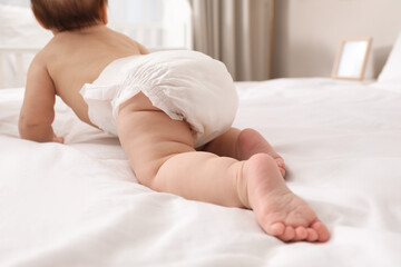 Poster - Little baby in diaper on bed at home, back view