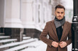 © Petro - Handsome young business man outside in winter