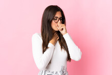 Young Brazilian Woman Isolated On Pink Background Coughing A Lot