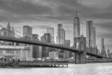 Fototapeta Nowy Jork - New York City skyline cityscape of Manhattan with brooklyn bridge in USA