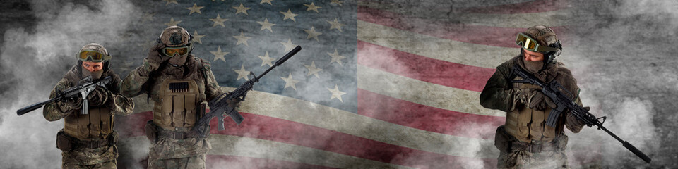 Three professional special forces soldiers, during a special operation is shrouded, in smoke against a US flag background. Defending flag. Photo format 4x1.