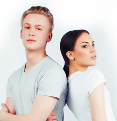 Wall Mural - modern hipster guys together couple diverse nations, asian girl and caucasian blond boy isolated on white background, lifestyle people concept