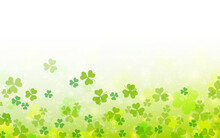 St.Patrick's Day Blurred Vector Background With Clover Leaves And Light Effects