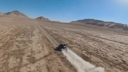 Wall Mural - Off-road Car Driving in the Desert