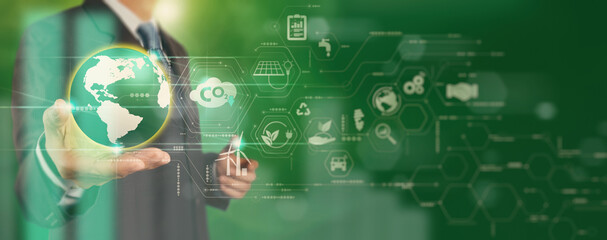 businessman working virtual globe modern computer to reduce co2 emissions carbon footprint climate c