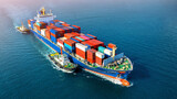 Aerial view of cargo ship with cargo container on sea.