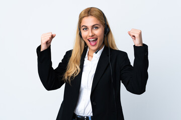 Sticker - Young telemarketer woman over isolated white background celebrating a victory