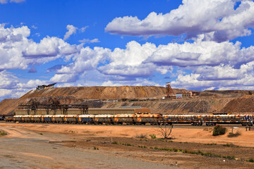 Wall Mural - BH Mines freight trains day clouds