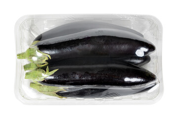 Packaged and labeled fresh eggplant on isolated white background