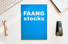 FAANG stocks report illustration. Flat lay, top view.