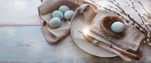 Easter Breakfast Still Life With Pussy Willow On Bright Wood. Horizontal Easter Background With Space For Text. Top View