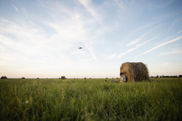 Aufkleber - Farmer with laptop and drone on the field. Smart farming and agriculture digitalization	