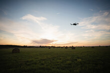 Drone Flies Over A Field. Smart Farming And Precision Agriculture	