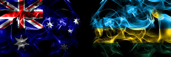 Flags of Australia, Australian vs Rwanda. Smoke flag placed side by side on black background