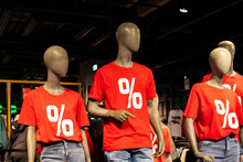 Three Dummy Mannequin Models Wearing Red Shirts With White Text Percent Sign.sale Of Fashion Shop.sale, Shopping Concept