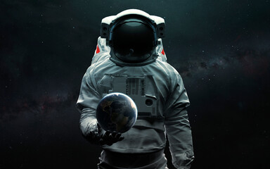 Wall Mural - Astronaut holding Earth planet in hand. 3D sci-fi art. Elements of image provided by Nasa