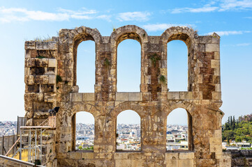 Wall Mural - Ancient Greek ruins in Athens, Greece, Europe. Odeon of Herodes Atticus overlooking city.