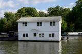 Fototapeta  - Houseboat is towed on River Thames