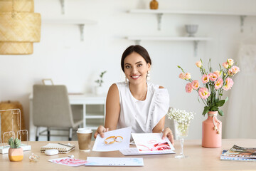 Poster - Female wedding planner working in office