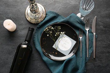 Canvas Print - Beautiful table setting with wedding invitation on black background