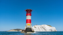 Front View Of The Needles Lighthouse And Chalk Rocks In Alum Bay, Isle Of Wight, United Kingdom
