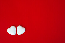 White Hearts On A Red Background