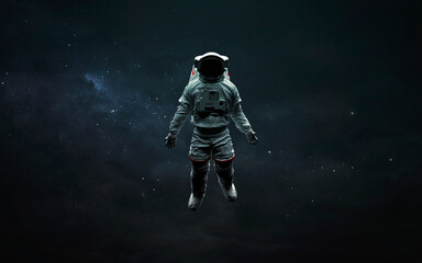 Wall Mural - Astronaut at spacewalk in deep space. 3D sci-fi art. Elements of image provided by Nasa