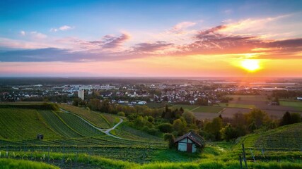 Wall Mural - Time-lapse of the city of Lahr and nearby vineyard at sunset in Germany