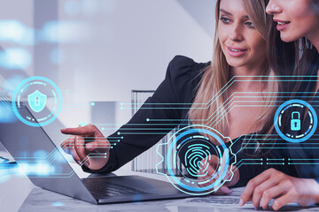 Poster - Two woman with laptop on desk, hologram with lock and fingerprin