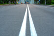 © O.PASH - The asphalted road. The highway with a white marking.