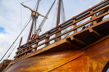 Old Wooden Ship With Lowered Sails, View From Below.