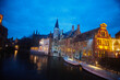 Canals in the evening light in the historic city centre of Bruges in Belgium