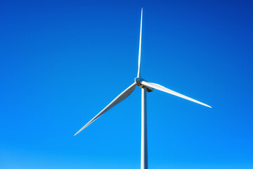 Wall Mural - wind turbines on a beautiful blue sky in a mountain wind farm in sardinia. renewable energy concept,