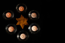 Burning Candle On Black Background. Holocaust Memory Day