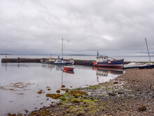 Various Boats Moored At Broadford Bay, Broadford, Isle Of Skye, Scotland, UK
