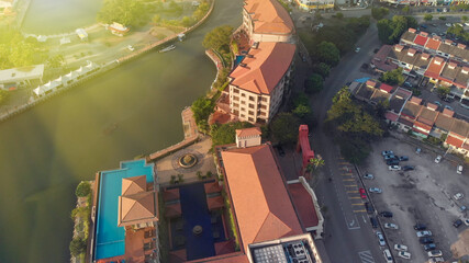 Canvas Print - Malacca, Malaysia. Aerial view of city homes and skyline from drone on a clear sunny day