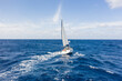 Sailing vessel on open water under clear skies in the atlantic ocean