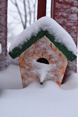 Wall Mural - Snow on a Birdhouse