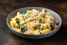 Fusilli Pasta With Bacon, Kale And Parmesan Cheese. Healthy Food