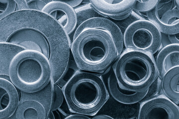 Aufkleber - Abstract industrial textured metal background with many metal washers for bolts and screws close-up